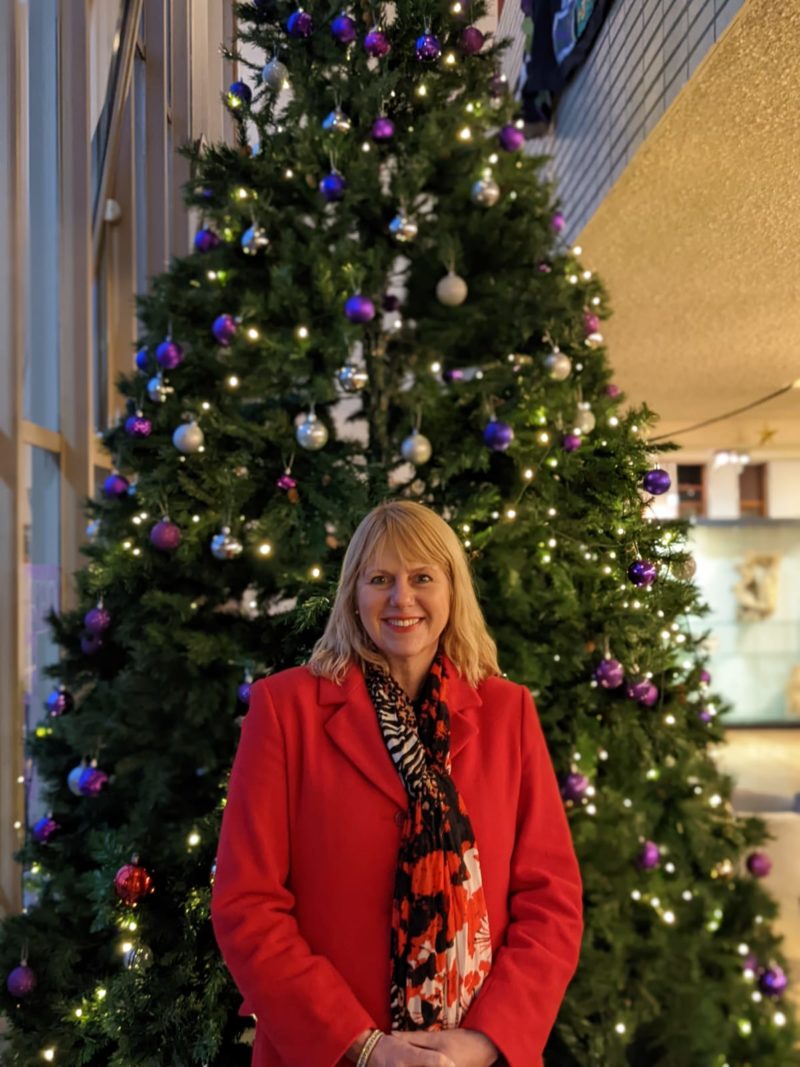 Carolyn with Christmas Tree